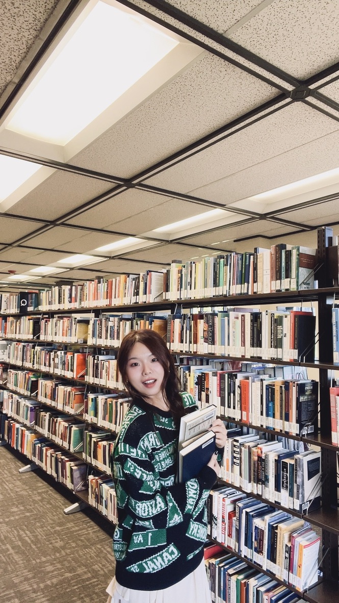 Vivian in a library